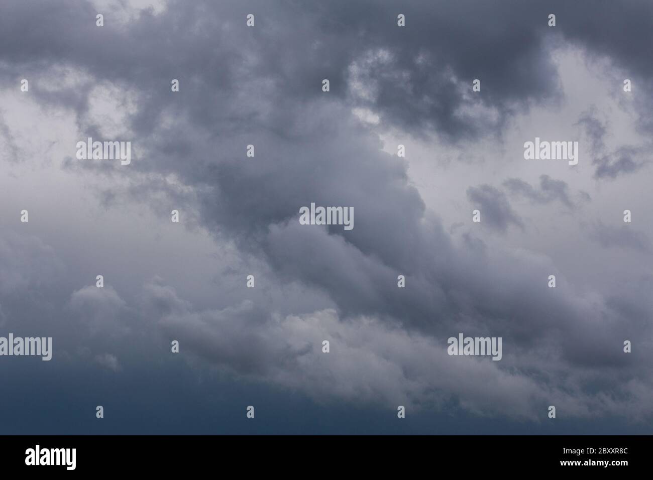 gray incoming storm clouds dark closeup backdrop Stock Photo - Alamy