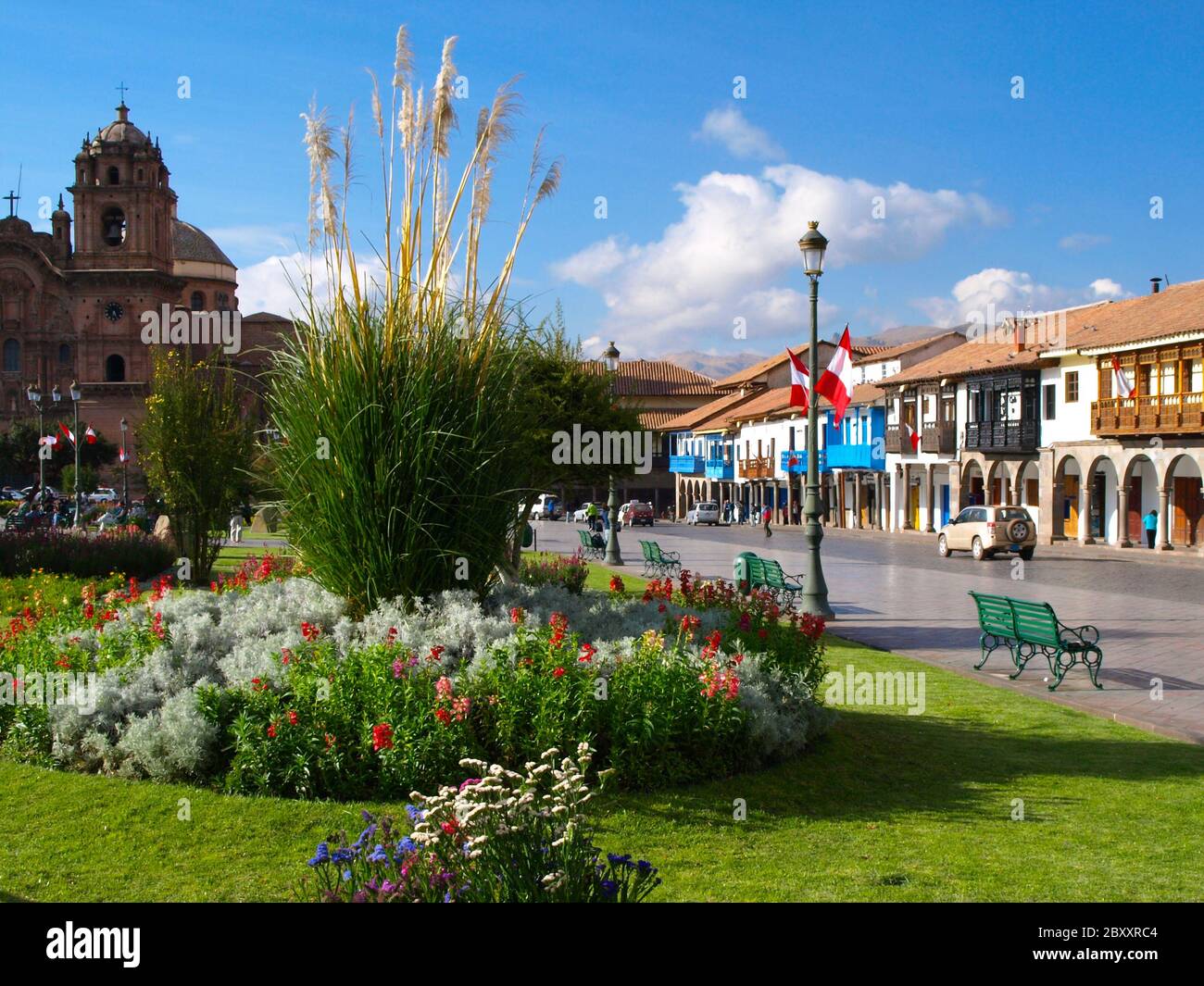 Greenery and colonial architecture of Plaza de Armas in Cusco, Peru Stock Photo