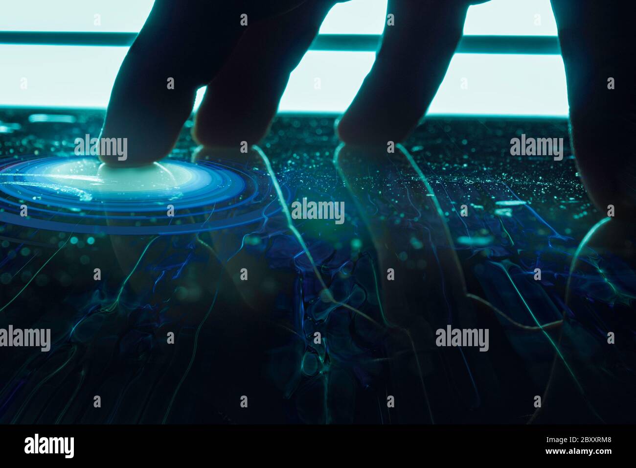 hand touching a screen table with technological interface. interface visual table screen. Concept of internet of things Stock Photo