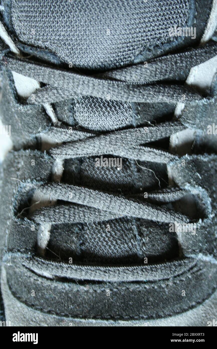 Black sneaker shoe laces Stock Photo Alamy