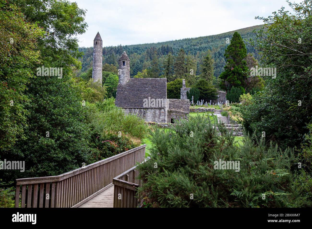 Glendalough in Ireland's Wicklow Mountains National Park preserves an early Medieval monastic settlement founded in the sixth century by St. Kevin. Stock Photo