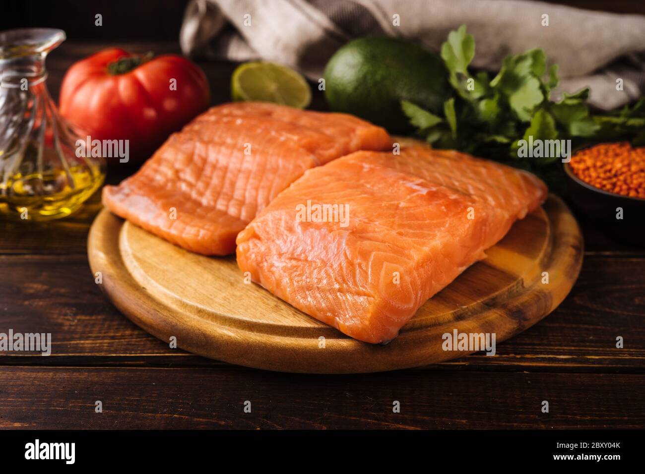 Close up of salmon fillet around healthy diet food products Stock Photo