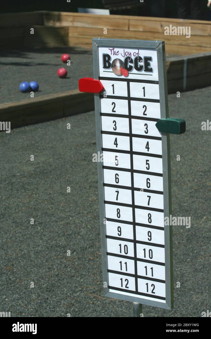 A Bocce ball score board on a court Stock Photo