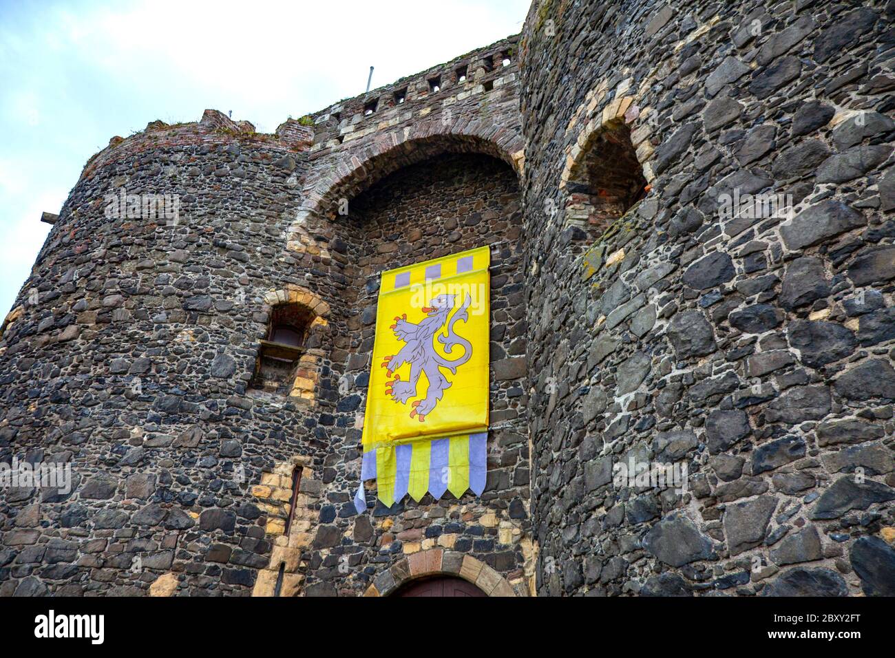 Carrickfergus Castle is a Norman castle in Northern Ireland, situated in the town of Carrickfergus in County Antrim, on the northern shore of Belfast Stock Photo