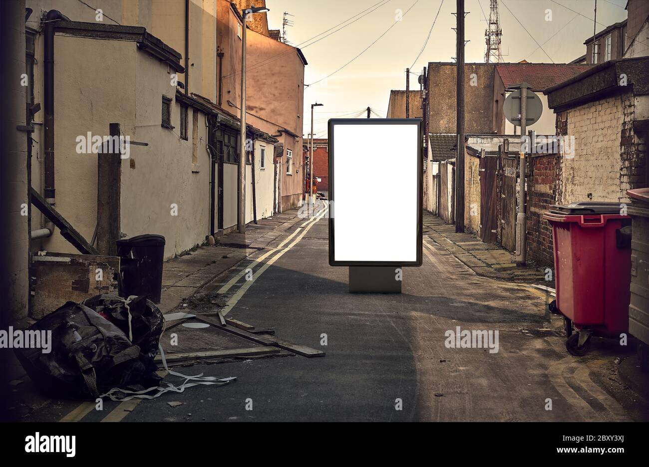 Blank advertising mockup in the street . Poster billboard on city dirty alley background Stock Photo