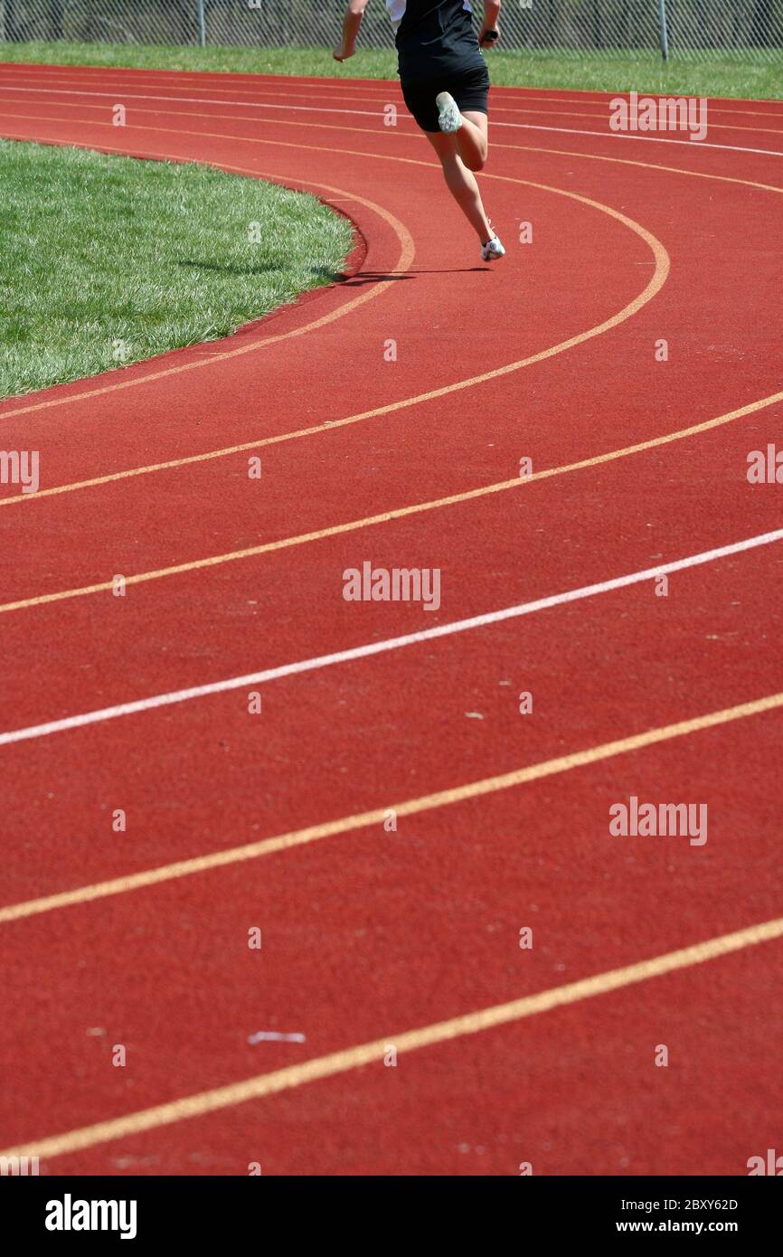 Runners running in a track race Stock Photo Alamy