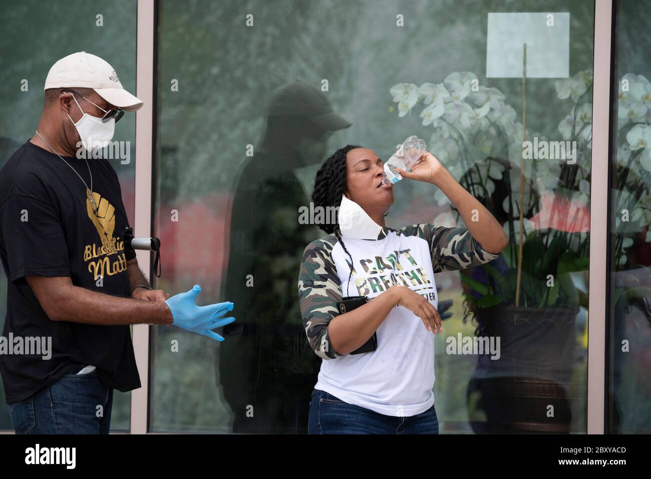 Guests prepare to file into Fountain of Praise church in southwest suburban Houston as a six-hour public visitation starts for George Floyd. Floyd's death two weeks ago at the hands of a white police officer in Minneapolis has spawned hundreds of anti-racism and anti-police brutality protests worldwide. Stock Photo