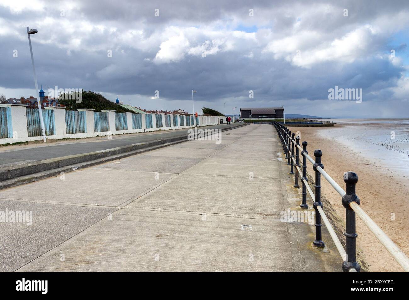 Promenade next to the beach, with the RNLI station in the distance