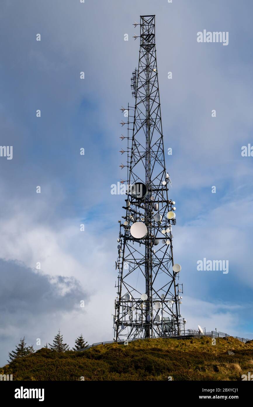 BTS) Base transceiver station with antenna isolated on blue sky background.  Telecommunications radio tower cells Stock Photo - Alamy
