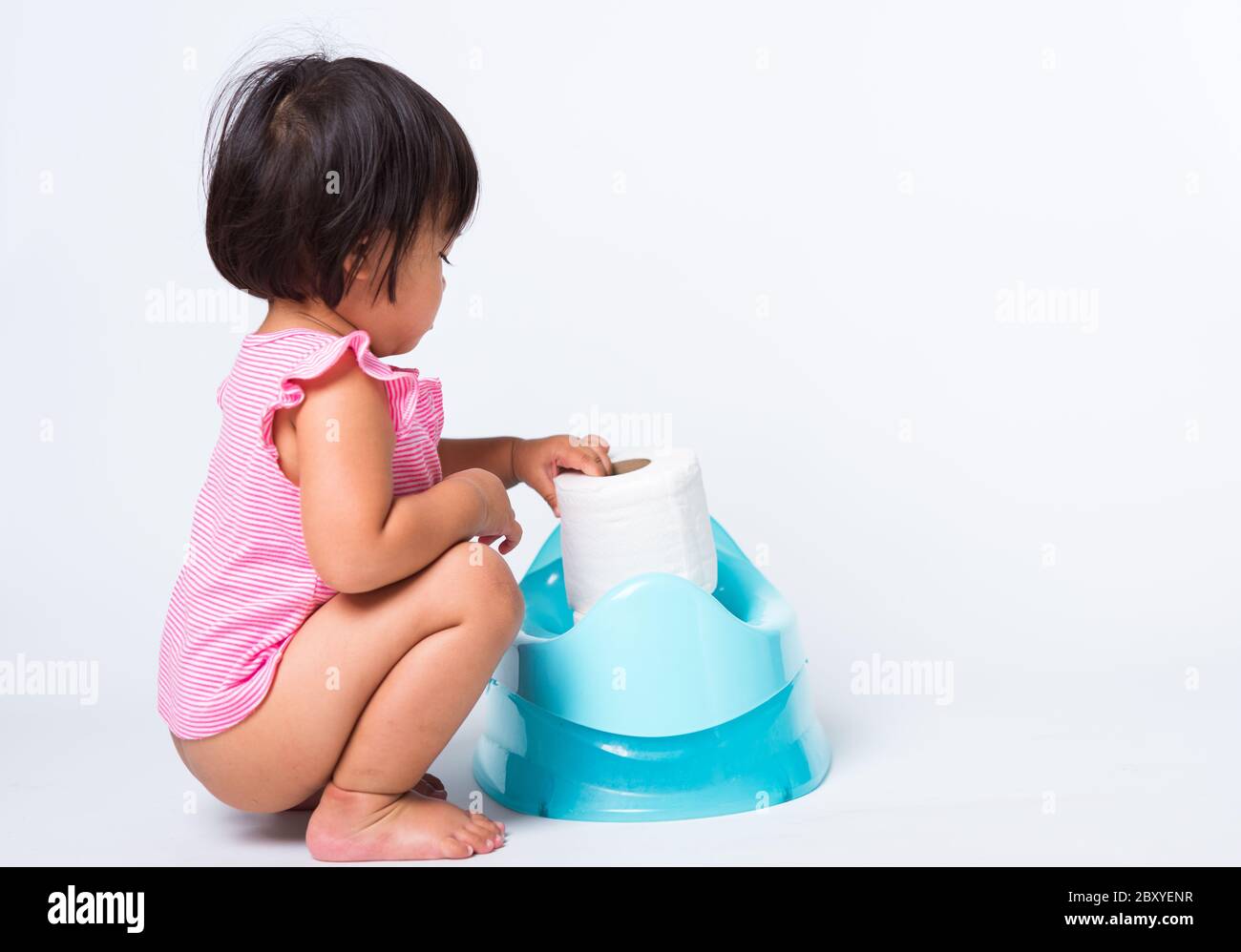Asian Little Cute Baby Child Girl Education Training To Sitting On Blue 