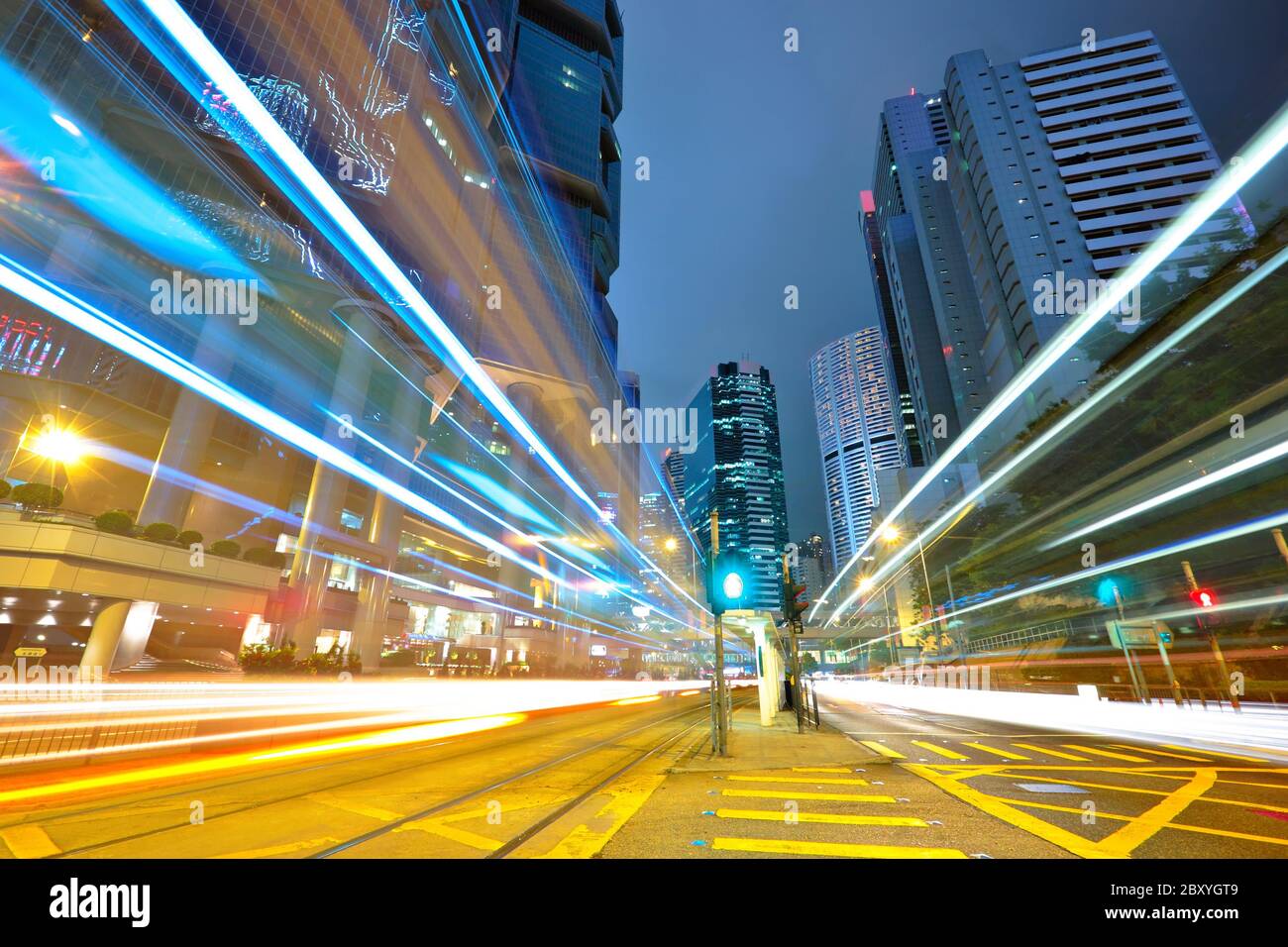 traffic light stream and highrise bulidings Stock Photo Alamy