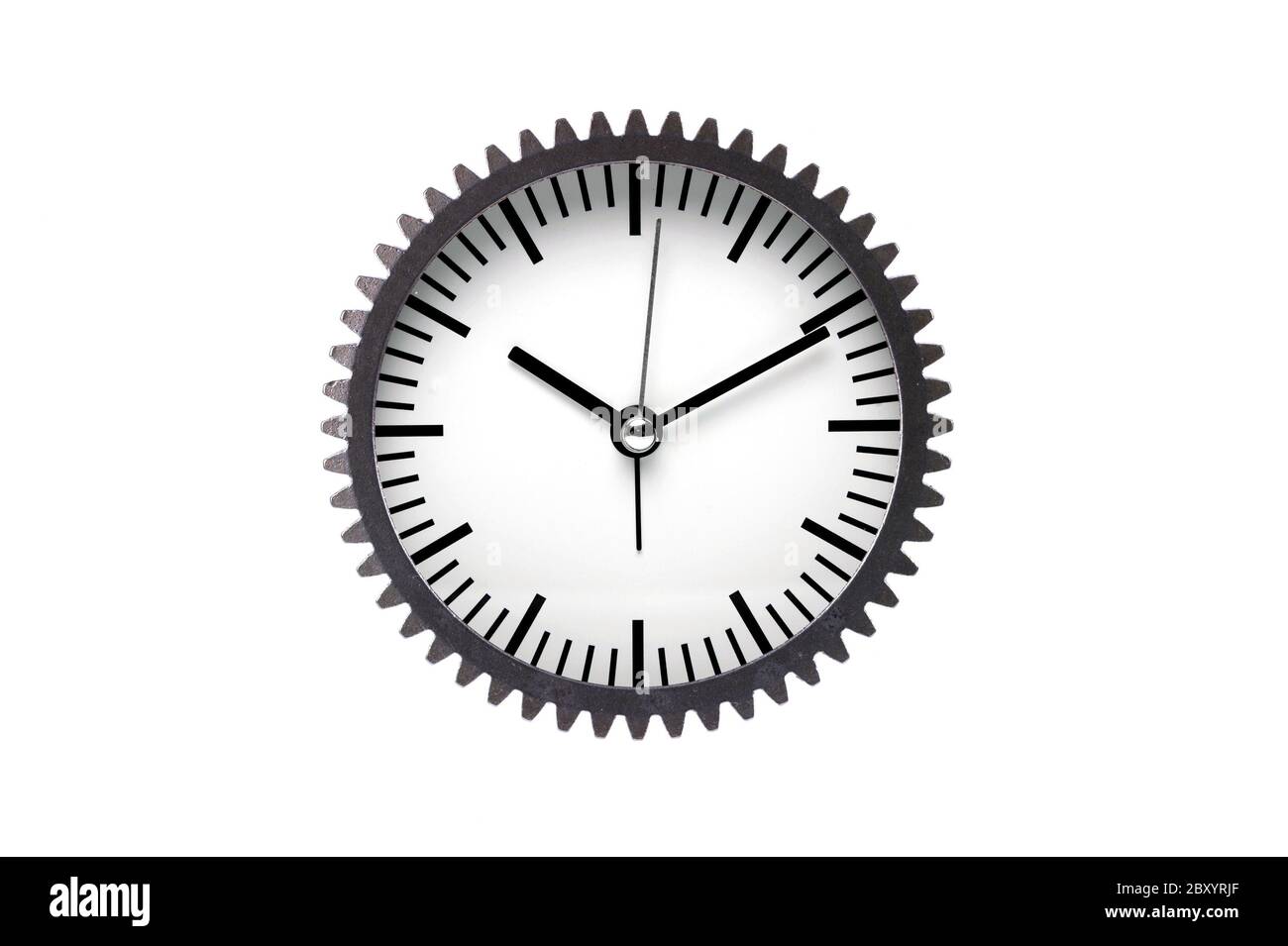 An analogue clock set against a white background Stock Photo