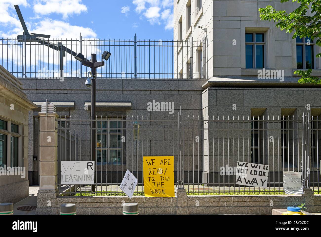 Ottawa, Canada - June 7, 2020: Signs hung on the fence of the US Embassy which was the site of a Black Lives Matter protest after the murder of George Stock Photo