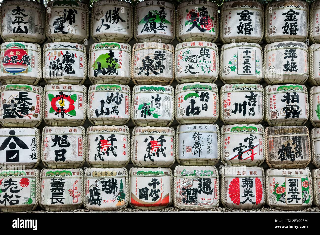 Tokyo Japan October 30th 2016 : Sake barrels used to ferment the rice wine on display at the Meiji Jingu Shrine in Tokyo Japan. Stock Photo