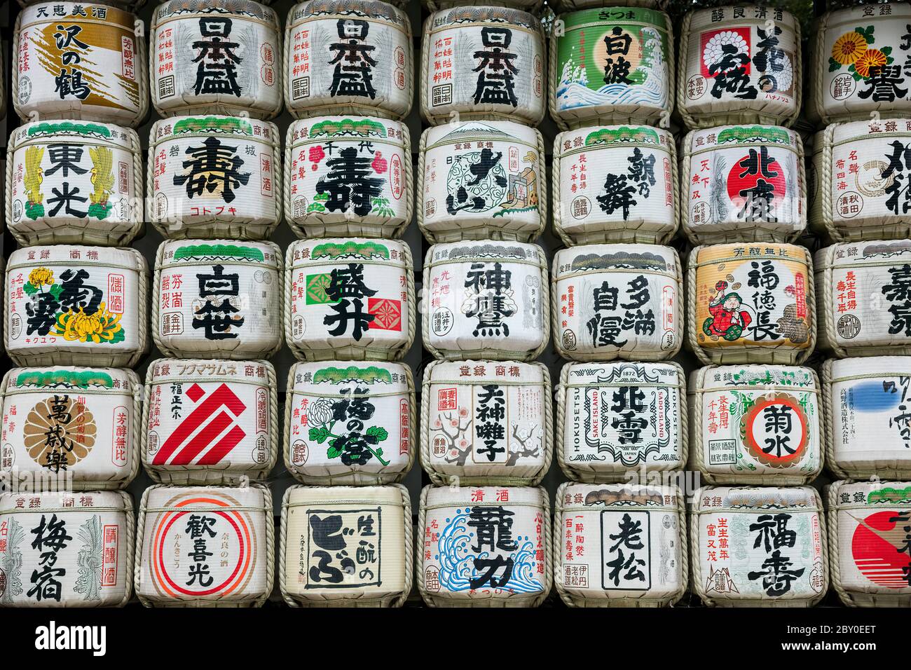 Tokyo Japan October 30th 2016 : Sake barrels used to ferment the rice wine on display at the Meiji Jingu Shrine in Tokyo Japan. Stock Photo