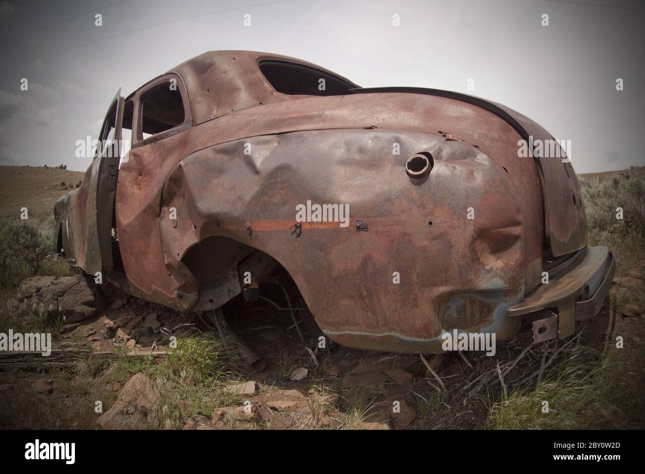 Old abandoned car with bullet holes Stock Photo - Alamy