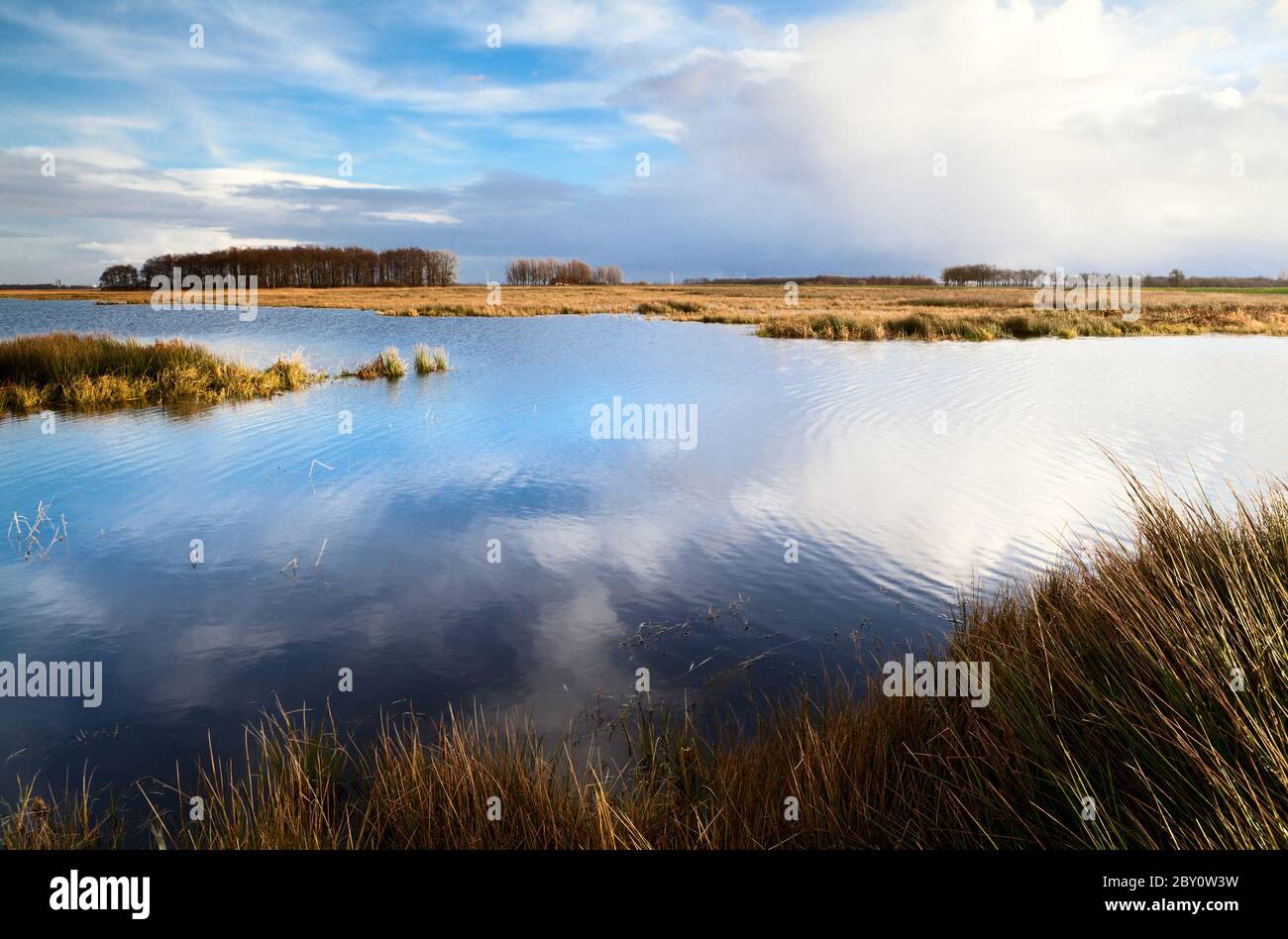 Landscape with cloudy sky Stock Photo - Alamy