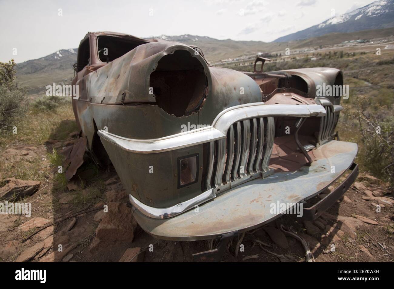 Old abandoned car with bullet holes Stock Photo - Alamy