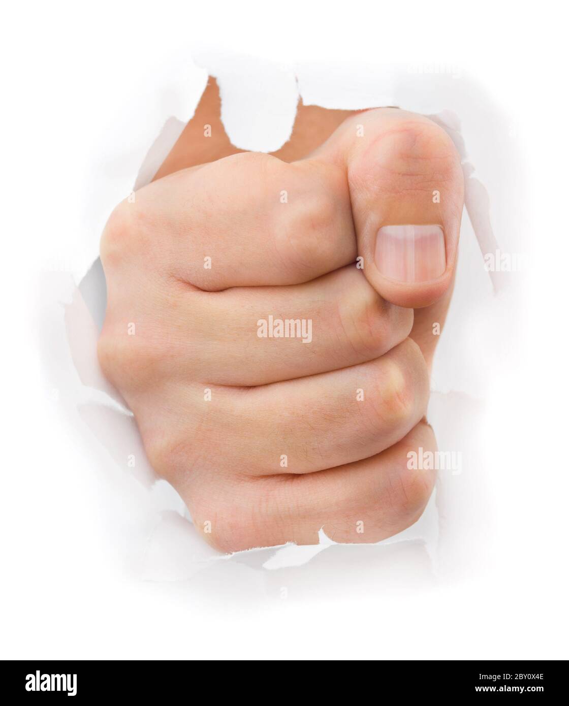 Fist punching paper Stock Photo Alamy