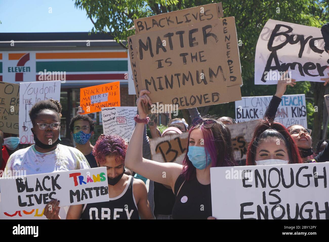 George Floyd Black Lives Matter Protest - Young People Holding up signs, Enough is Enough stock photograph - Ridgefield Park, New Jersey, USA, June 8t Stock Photo