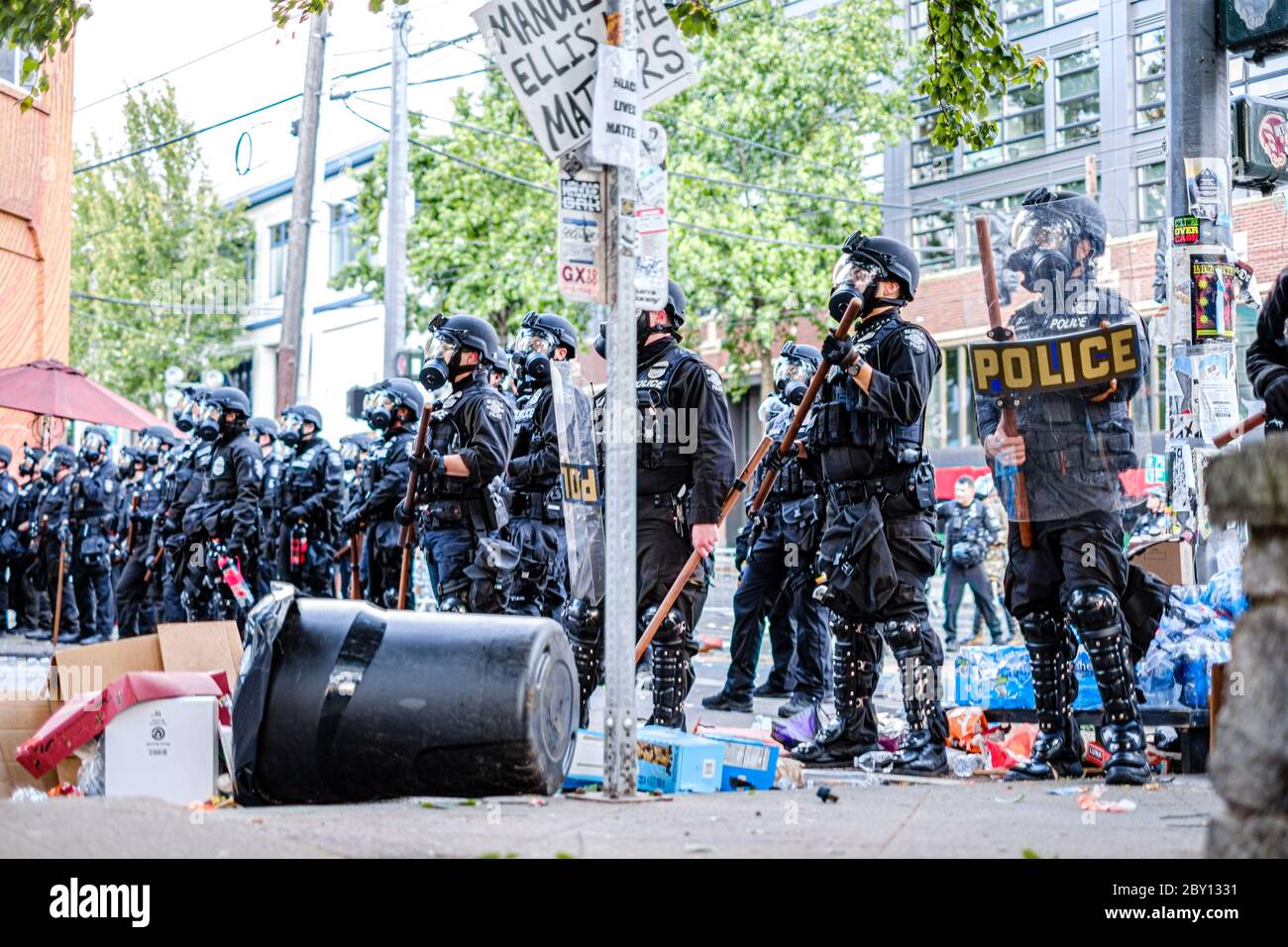 SEATTLE, USA - JUNE 6, 2020: Seattle Police holds the perimeter after dispersing demonstrators with flash bangs and pepper spray Stock Photo