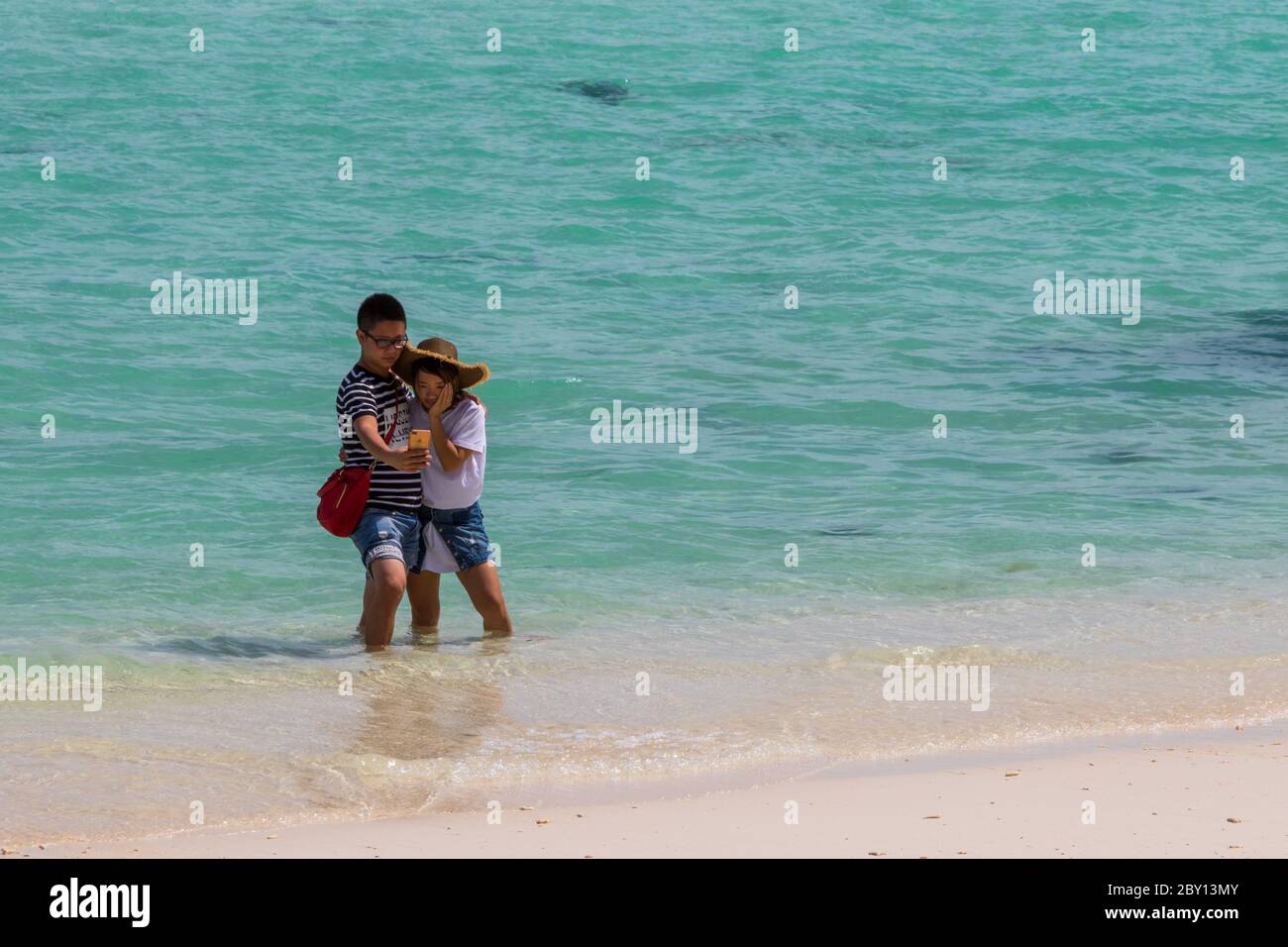 Mantanani Island Sabah Malaysia Circa September 2017 A Couple Was Happy Standing On Beach And Selfie Using Smart Phone At Mantanani Island Kota B Stock Photo Alamy