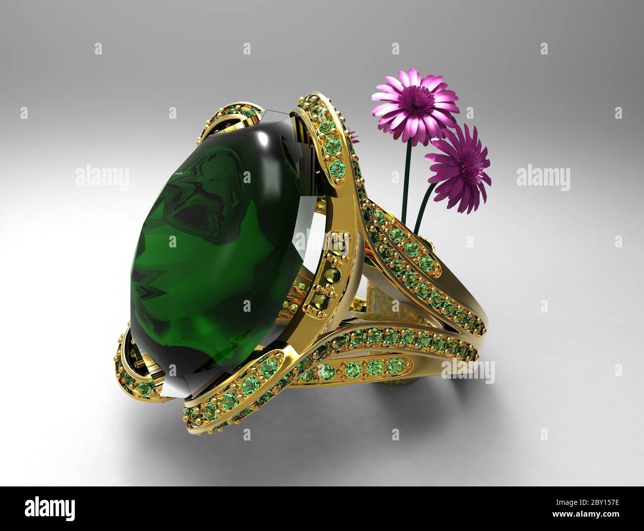 Emerald ring and flowers Stock Photo