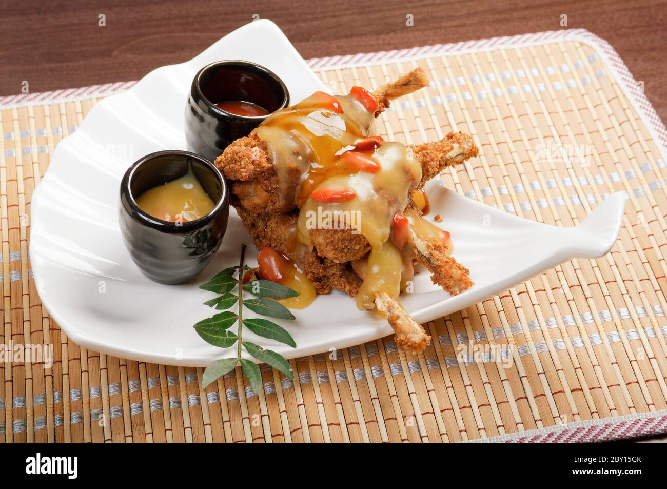 Fried frogs legs Stock Photo