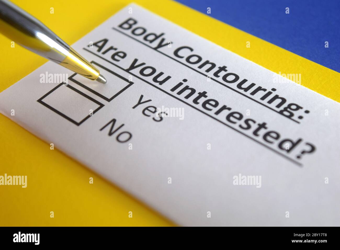 One person is answering question about body contouring. Stock Photo