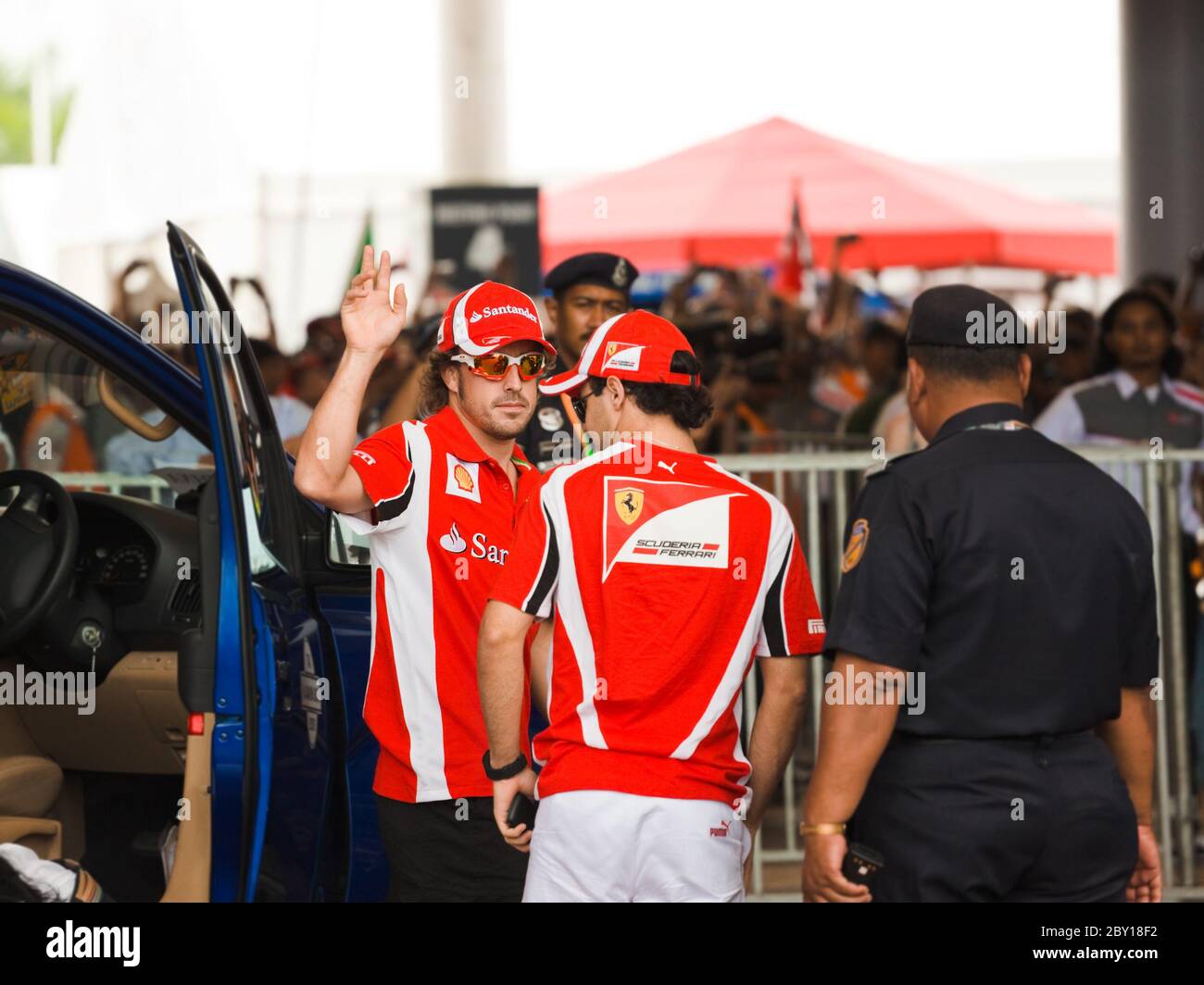 SEPANG, MALAYSIA - APRIL 10: Fernando Alonso and Felipe Massa (Ferrari) greet fans at the  autograph session on Formula 1 GP, Ap Stock Photo