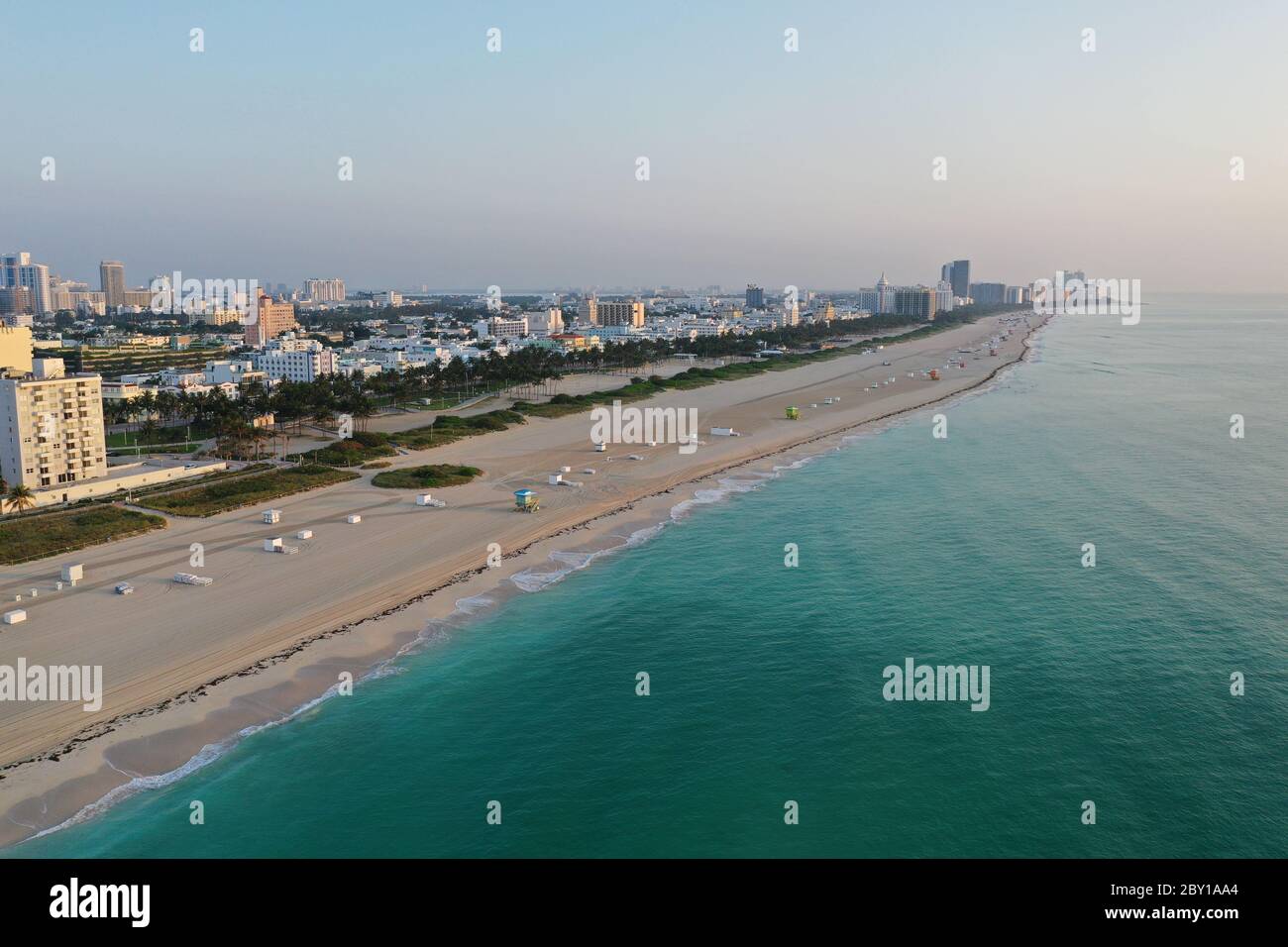 Aerial view of South Beach and Lummus Park in Miami Beach, Florida duing coronavirus beach, hotel, park and restaurant closures at sunrise. Stock Photo