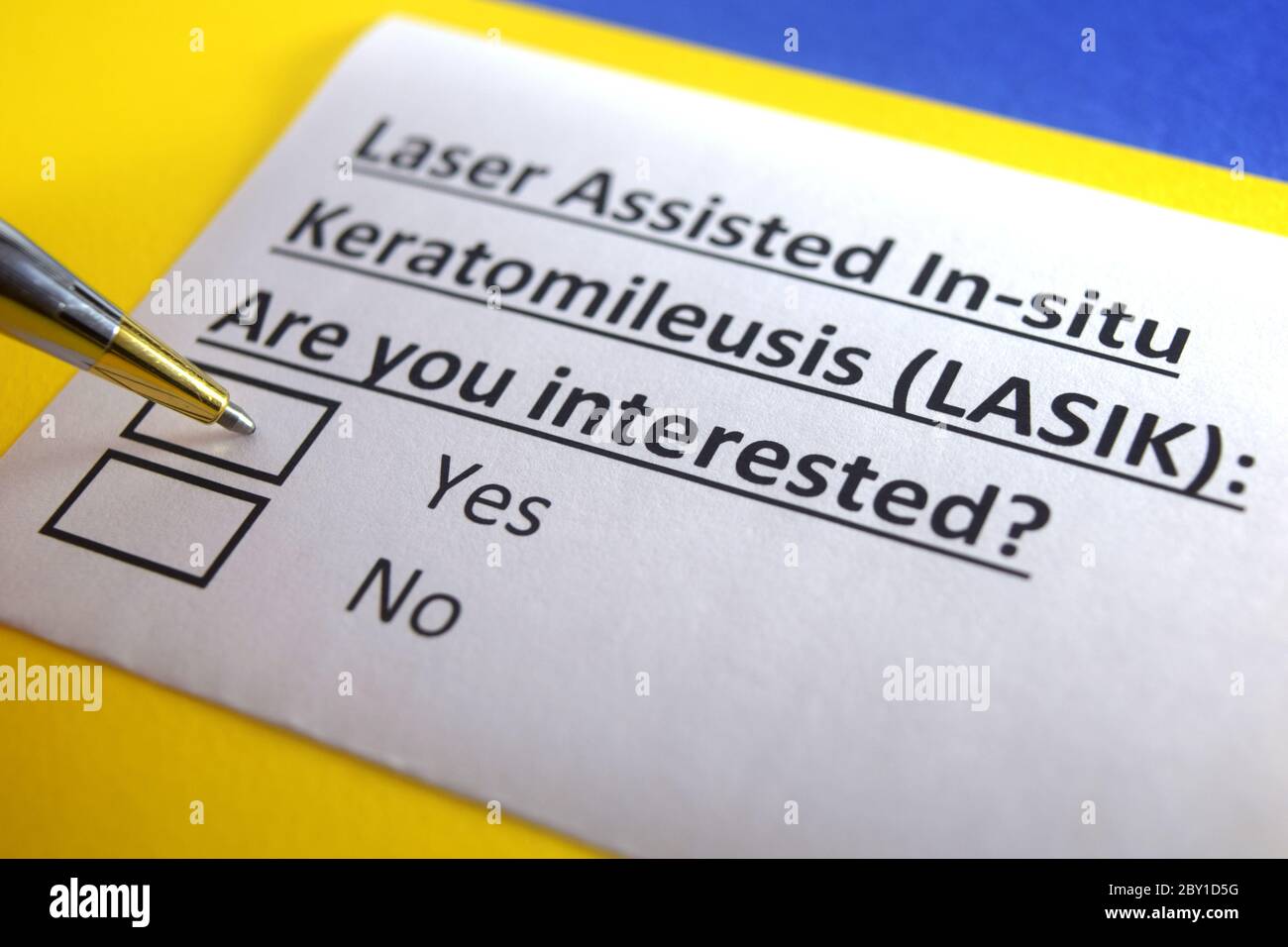 One person is answering question about laser assisted in-situ keratomileusis. Stock Photo