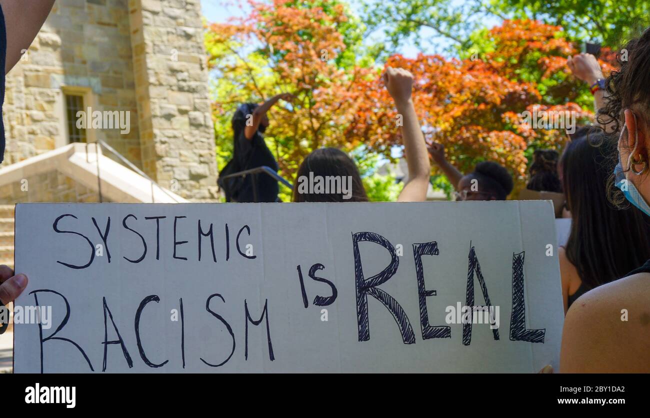 Black Lives Matter Protest George Floyd - Systemic Racism Is Real Sign lead by young black female - ridgefield park, bergen county, new jersey, usa mo Stock Photo