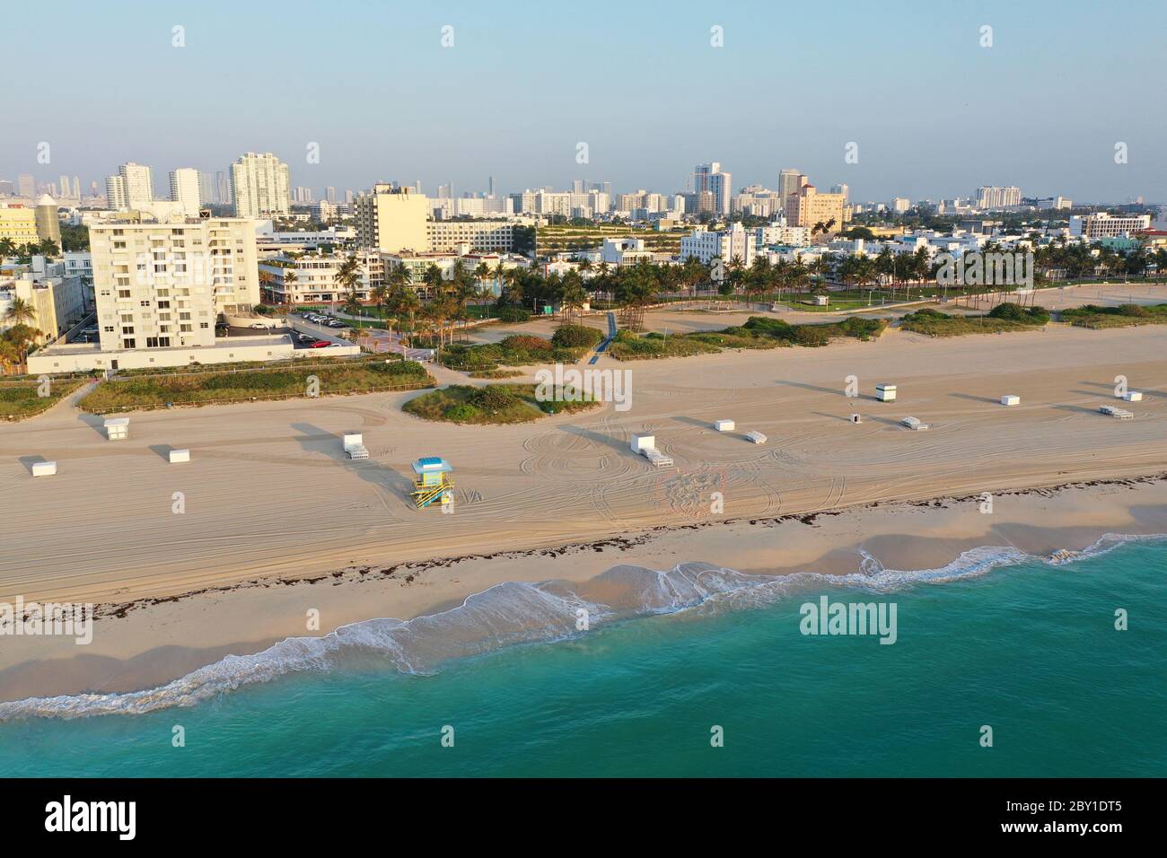 Aerial view of South Beach and Lummus Park in Miami Beach, Florida duing coronavirus beach, hotel, park and restaurant closures at sunrise. Stock Photo