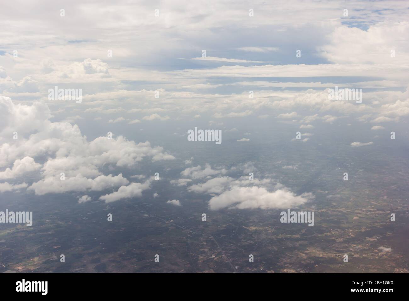 Blue sky with clouds background on the airplan Stock Photo - Alamy