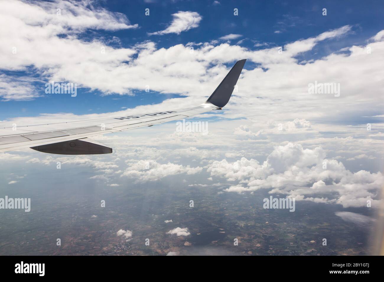 Blue sky with clouds background on the airplan Stock Photo - Alamy
