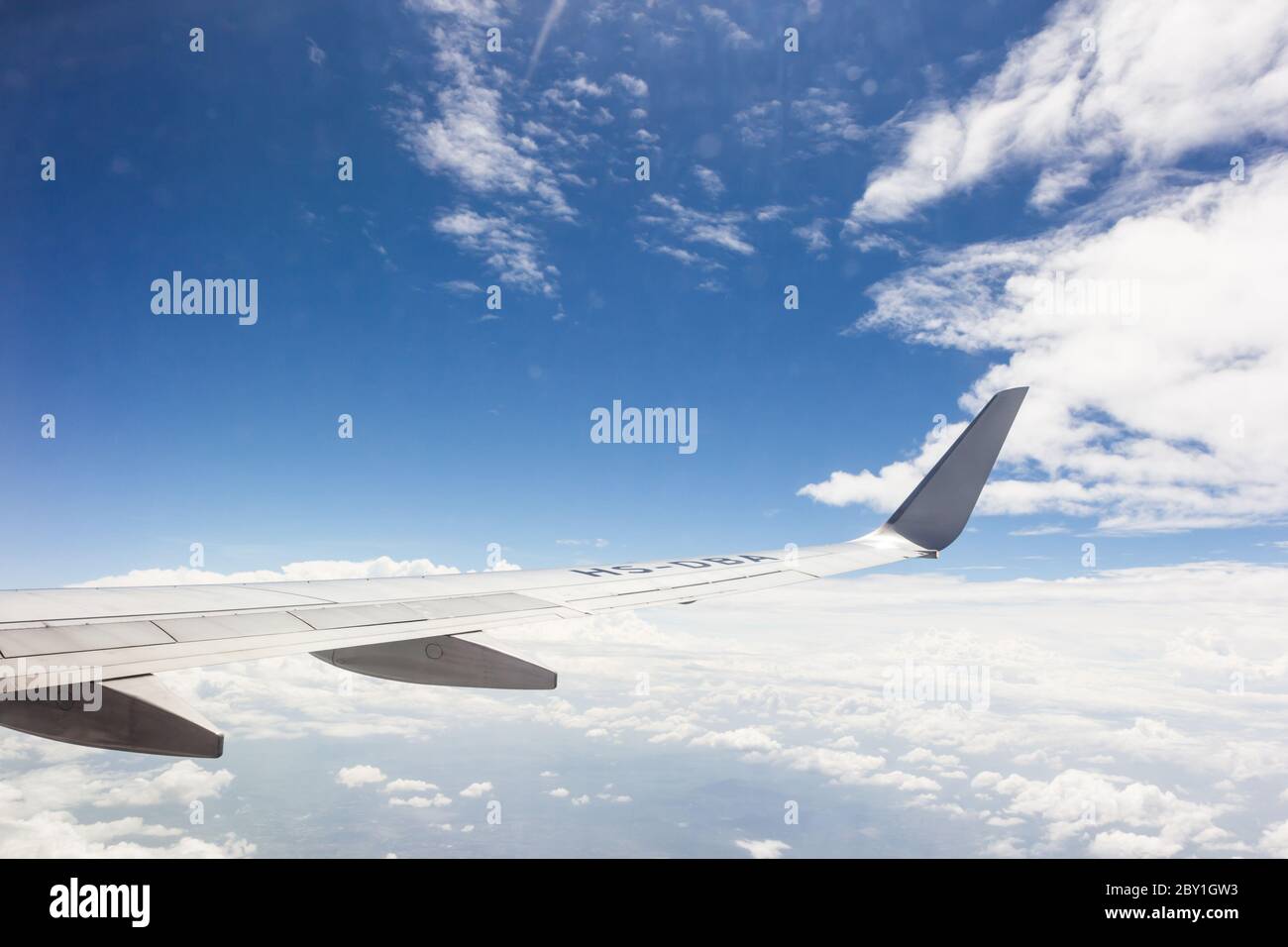 Blue sky with clouds background on the airplan Stock Photo - Alamy