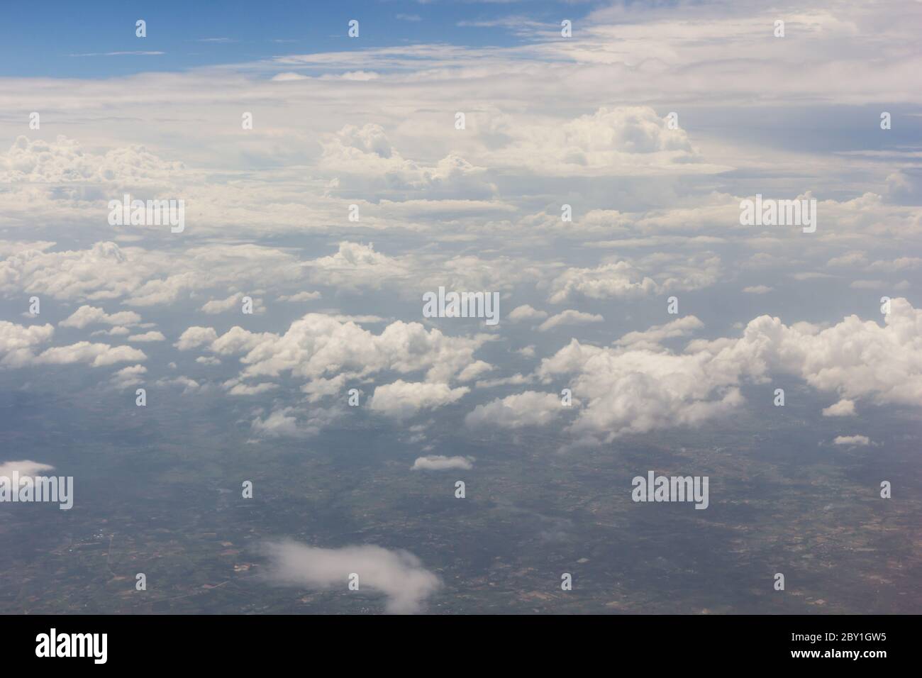 Blue sky with clouds background on the airplan Stock Photo - Alamy
