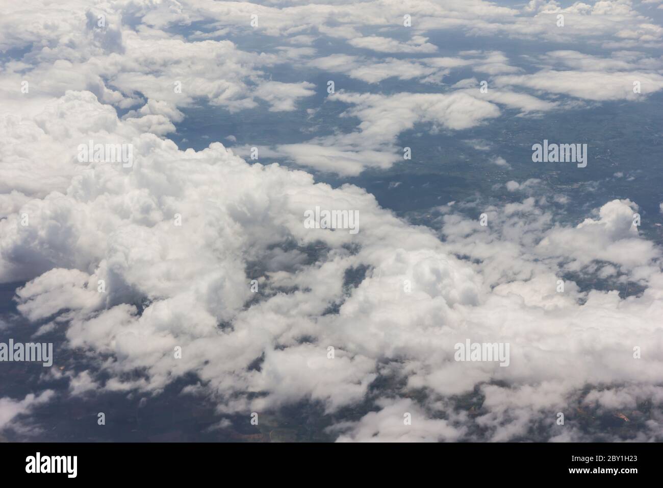 Blue sky with clouds background on the airplan Stock Photo - Alamy