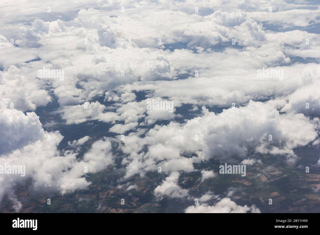 Blue sky with clouds background on the airplan Stock Photo - Alamy