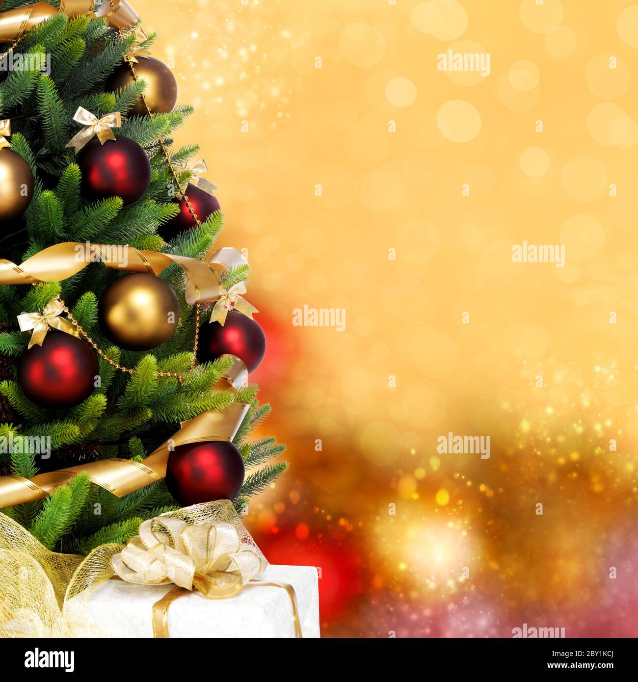 Decorated Christmas tree on white background Stock Photo - Alamy