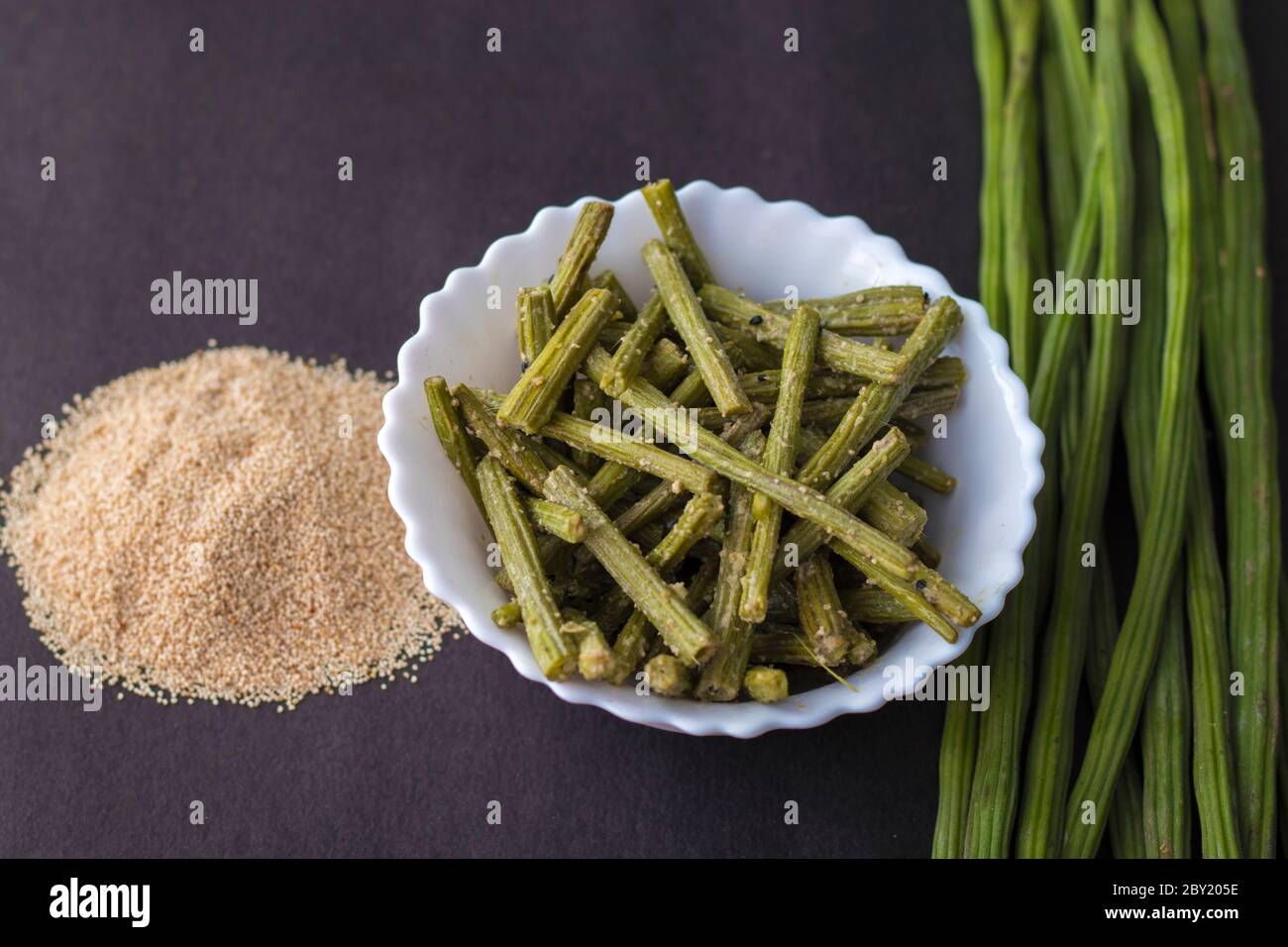 drumstick recipe with poppy seeds in Bengali style.Indian/Bangladeshi food. Stock Photo