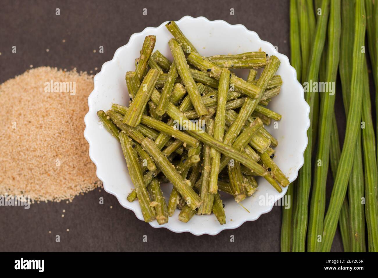 drumstick recipe with poppy seeds in Bengali style.Indian/Bangladeshi food. Stock Photo