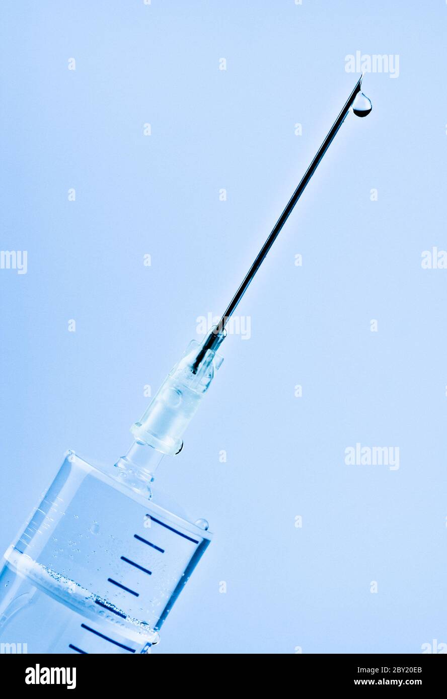 syringe with drop on needle Stock Photo Alamy