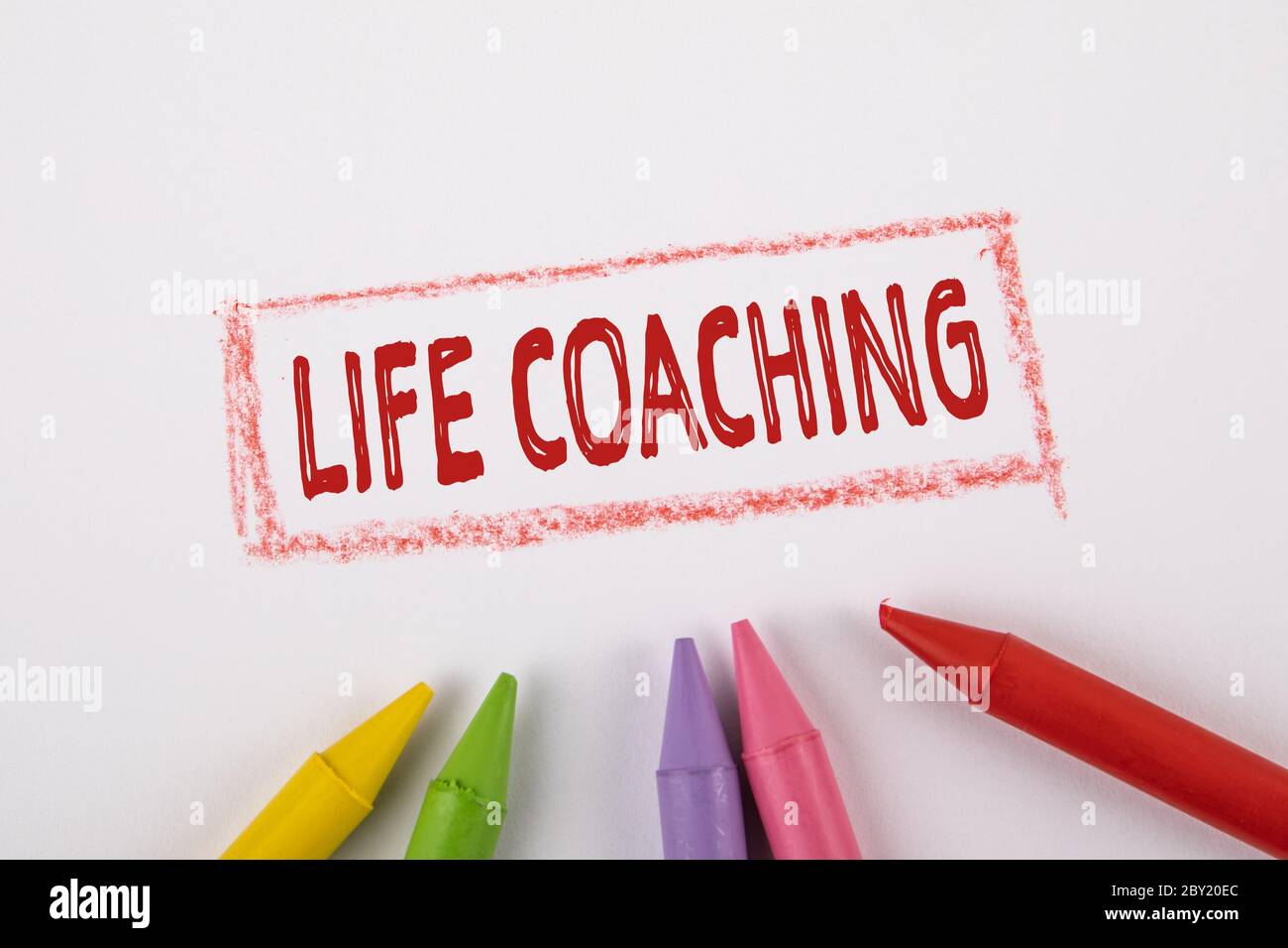 LIFE COACHING concept. Text on a white page. Colored pastels Stock ...