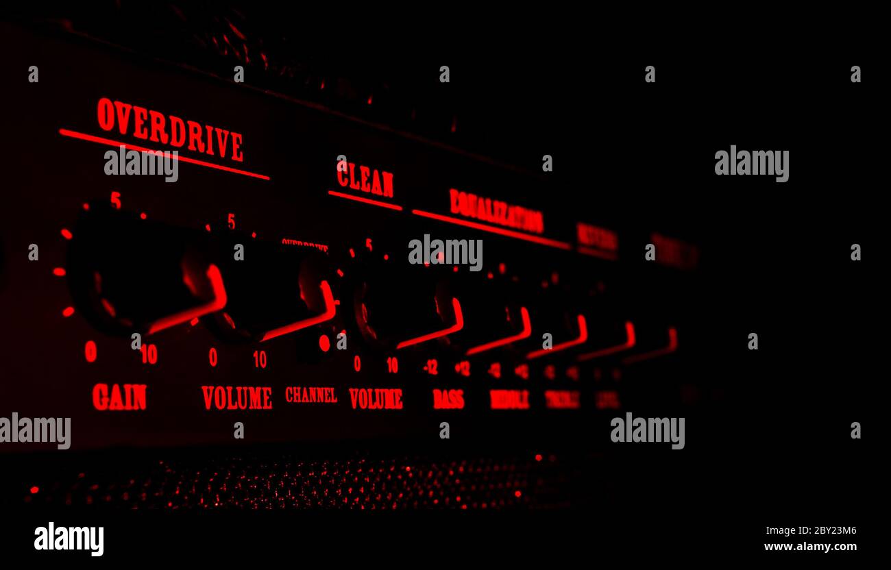 guitar amplifier control panel in red light Stock Photo Alamy