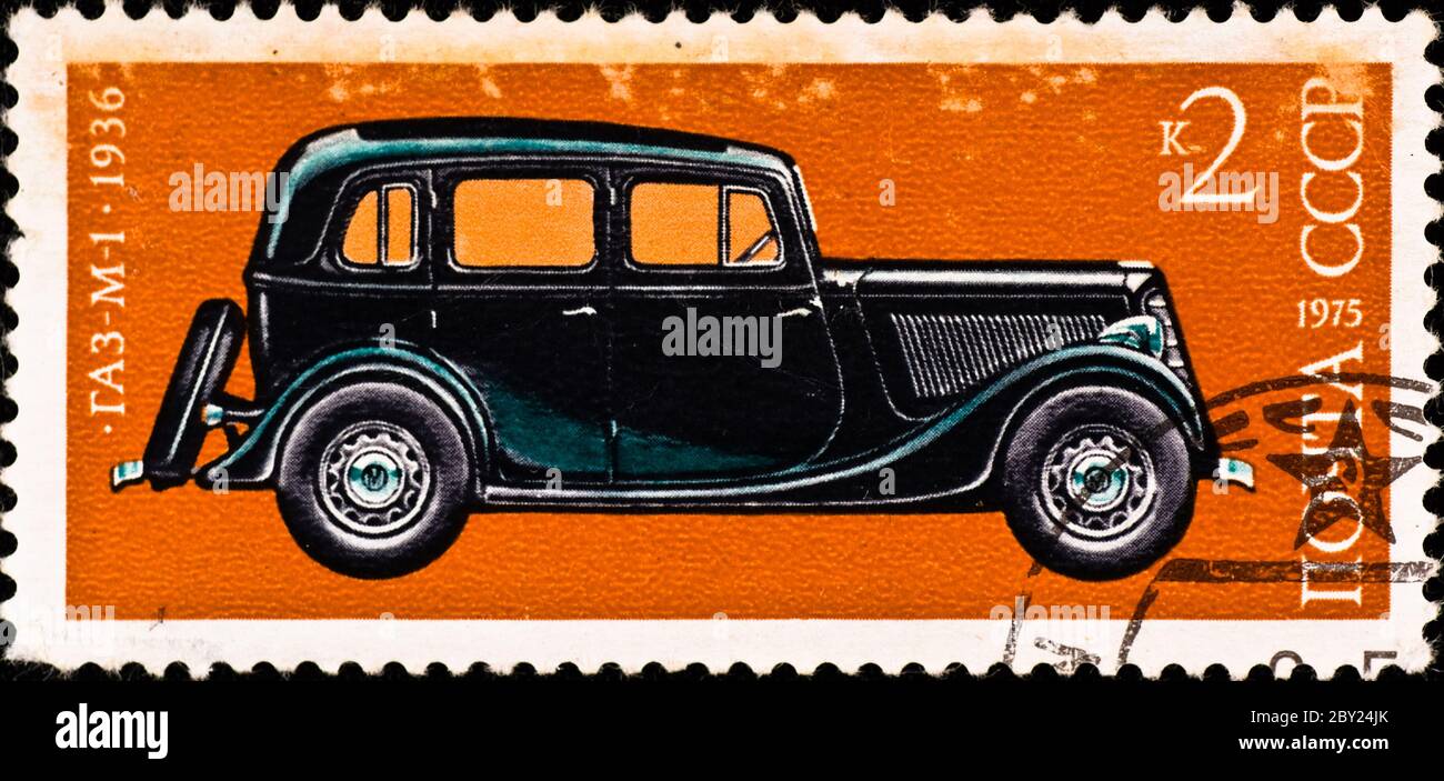 postage stamp shows vintage car GA-M1 Stock Photo