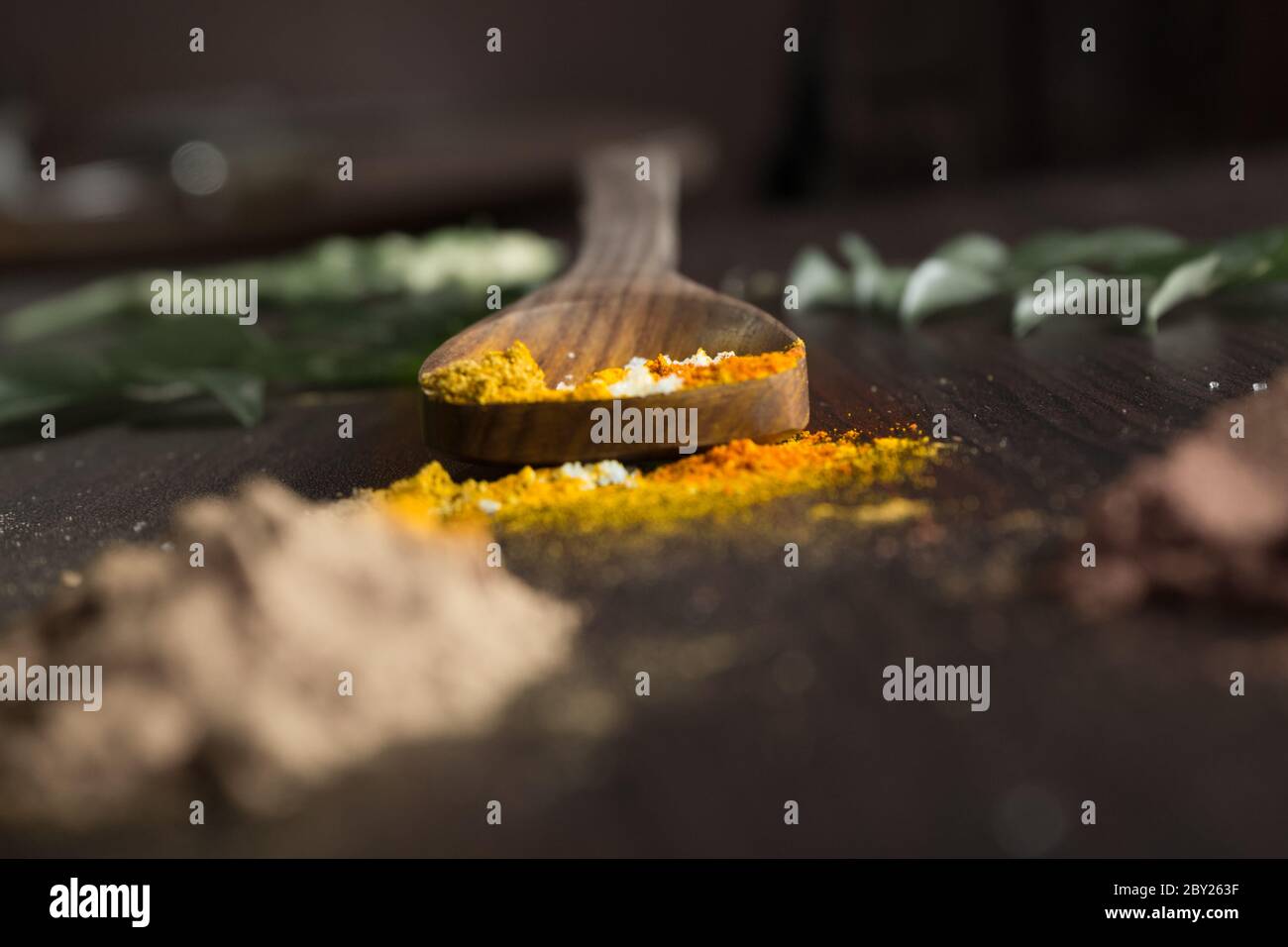 Beautifully garnished food ingredients on table top include various