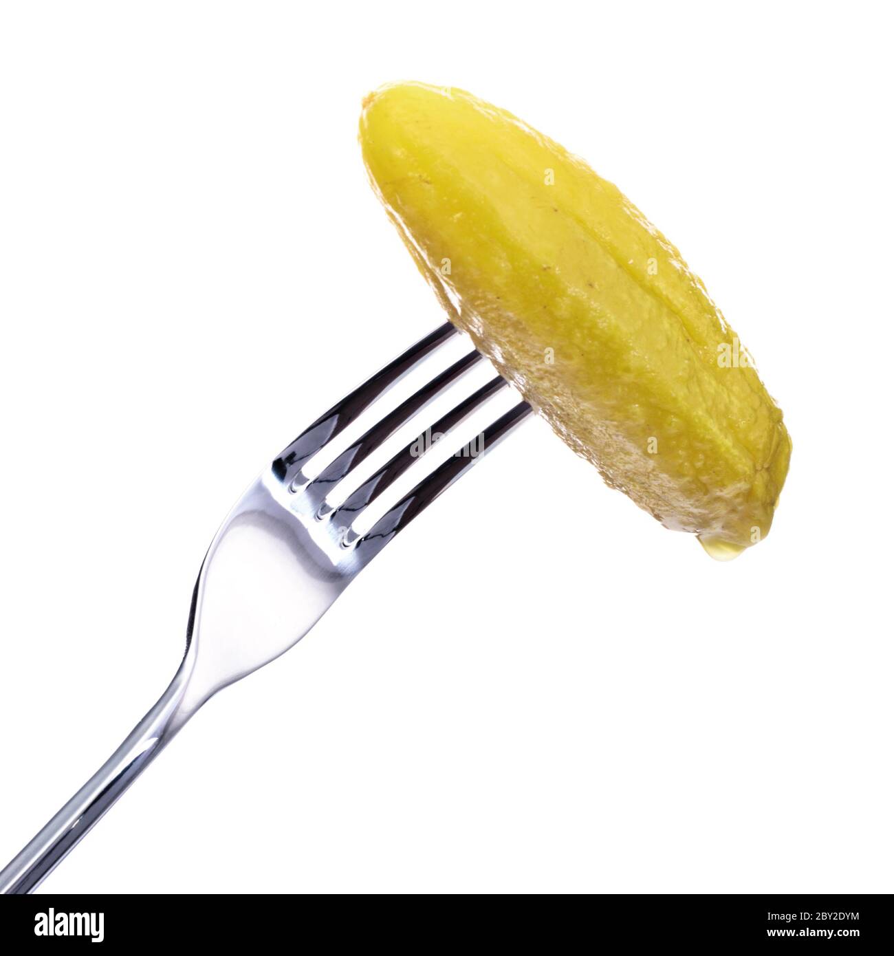 Dill Pickle on Fork Stock Photo