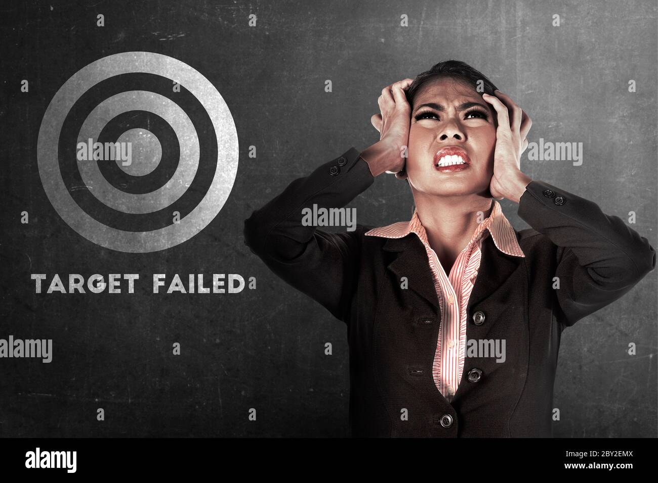Failing Target Asian businesswoman feeling depressed after failing to reach the target ...